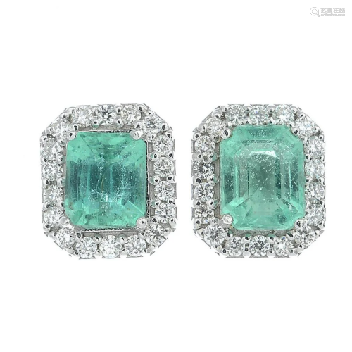 A pair of emerald and brilliant-cut diamond cluster