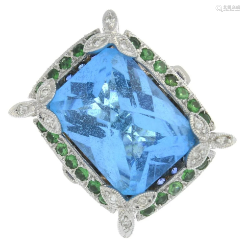 A blue topaz, diamond, sapphire and green garnet