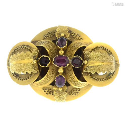 A garnet and purple gem brooch.Length 4.2cms. T…