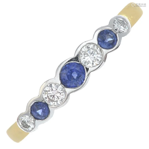 An 18ct gold sapphire and diamond seven-stone