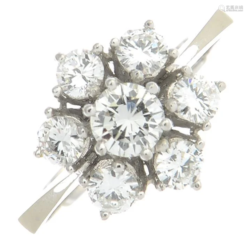 A diamond cluster ring.Estimated total diamond …