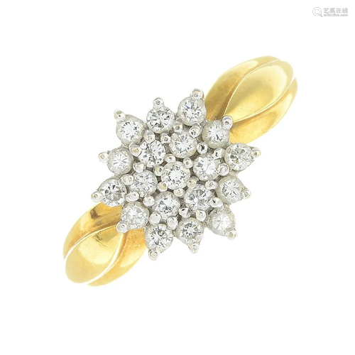 An 18ct gold diamond cluster ring. Total diamond w…