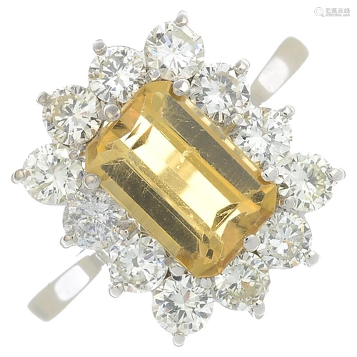 A yellow topaz and diamond cluster ring. Topaz