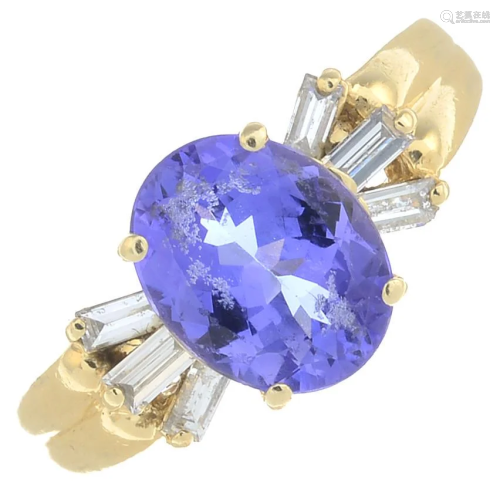 A tanzanite and diamond dress ring.Tanzanite…
