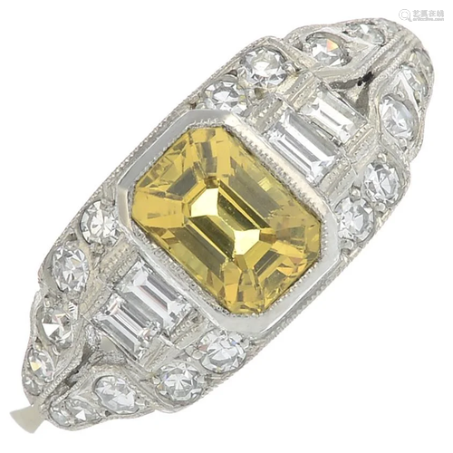 A vari-cut diamond and yellow sapphire ring.Yellow