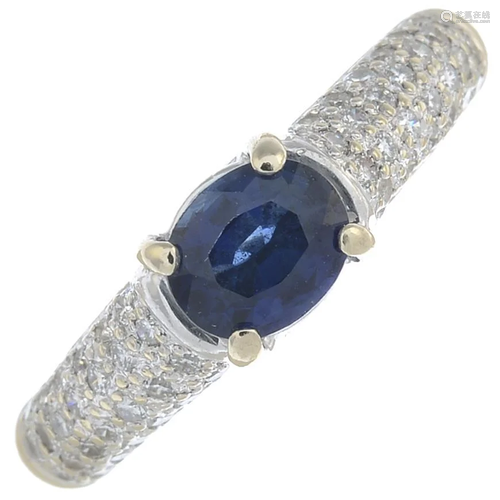 An 18ct gold sapphire and diamond ring.Estimated …