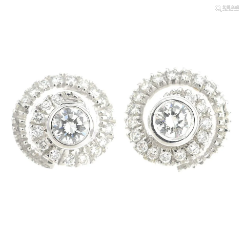 A pair of brilliant-cut diamond earrings, by