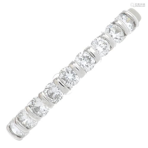 An 18ct gold brilliant-cut diamond half eternity ring.