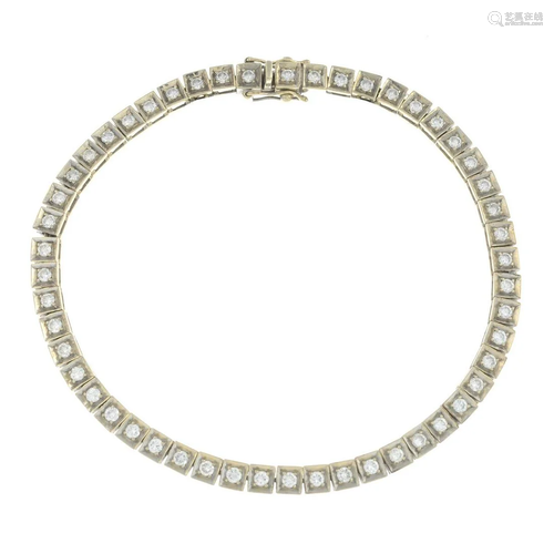 A brilliant-cut diamond line bracelet.Estimated total