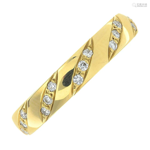 An 18ct gold brilliant-cut diamond accent band