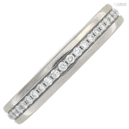 An 18ct gold diamond eternity ring, by Tiffany &