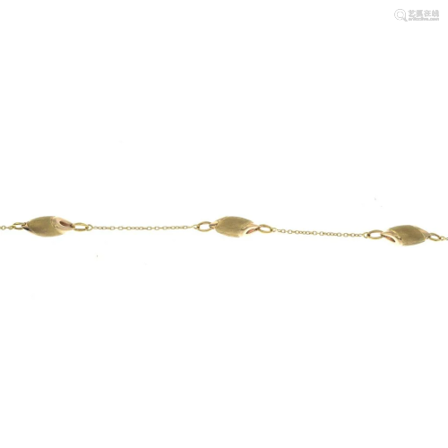 An 18ct gold adapted bracelet, with brilliant-cut