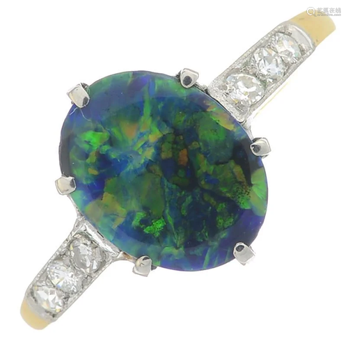 A black opal single-stone ring, with circular-cut