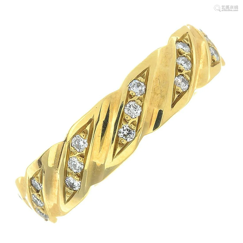 An 18ct gold brilliant-cut diamond band. Estimated