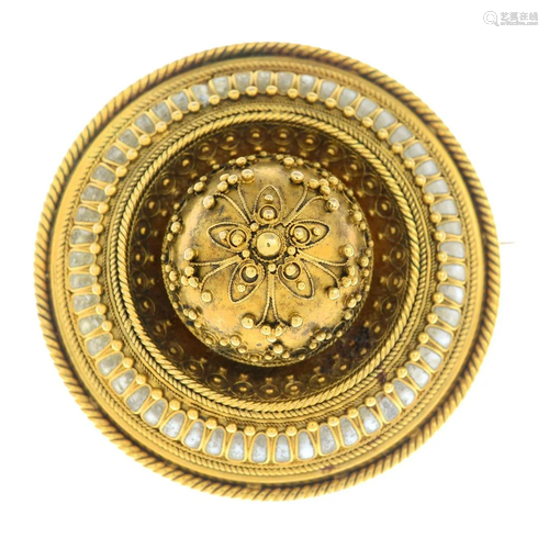 An early Victorian gold enamel brooch.Diameter 4cms.