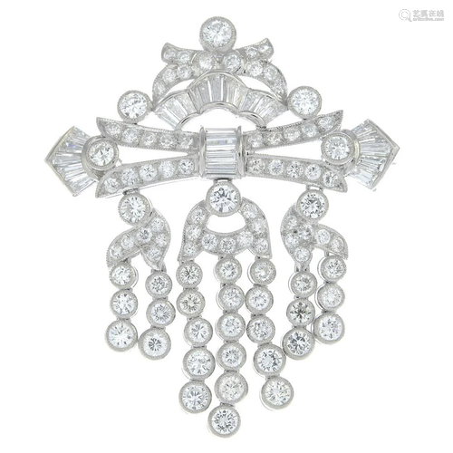 A diamond pendant, with brooch fitting. Estimated…