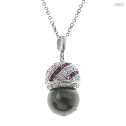 A vari-cut diamond, ruby and hardstone pendant,