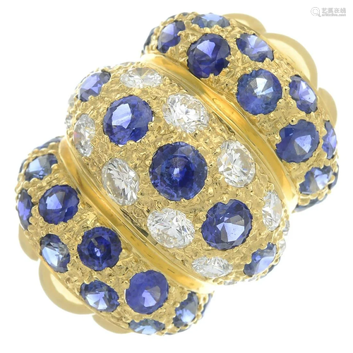 A sapphire and diamond dress ring.Estimated…