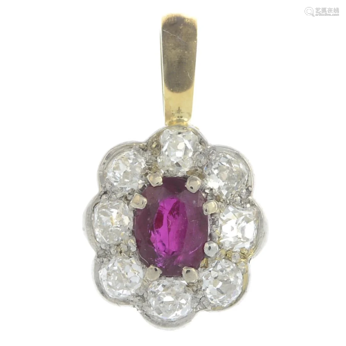 An old-cut diamond and ruby cluster pendant.Esti…
