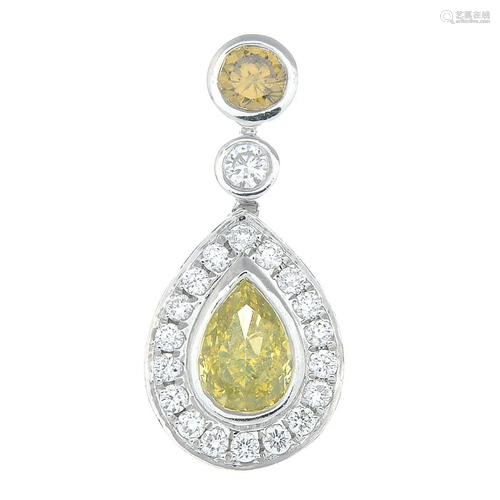 A diamond and 'coloured' diamond pendant.…