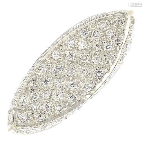 An 18ct gold pave-set diamond dress ring.Total dia…