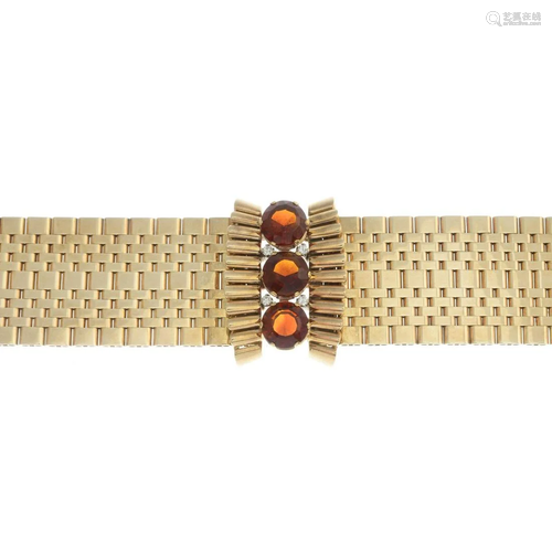 A 1960s 9ct gold citrine and diamond bracelet.Citrine