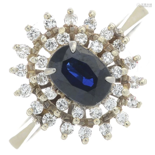 An 18ct gold sapphire and diamond cluster