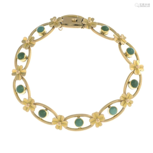 An early 20th century 15ct gold turquoise floral