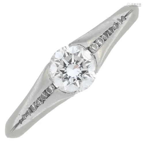 A platinum brilliant-cut diamond ring. Principal