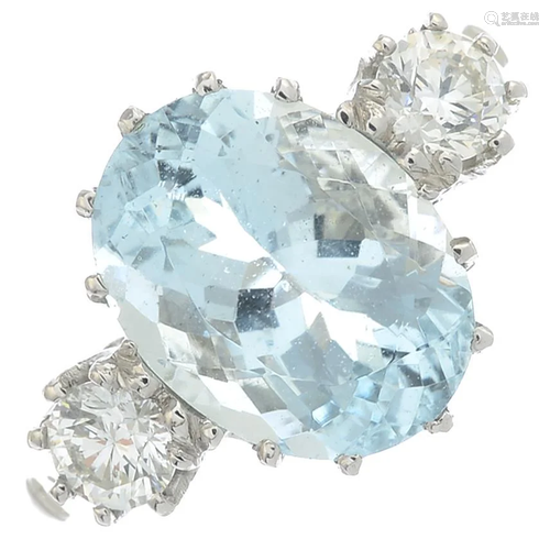 An aquamarine and brilliant-cut diamond ring.Aq…