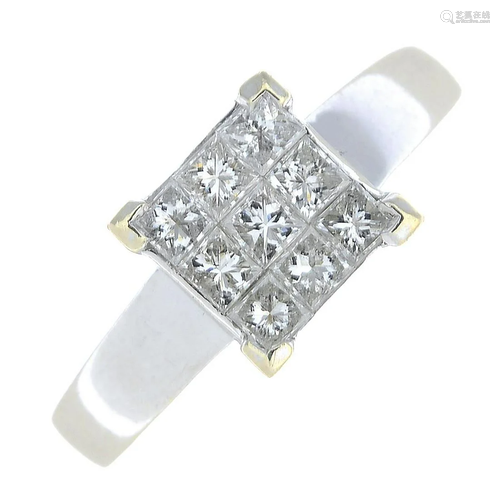 A square-cut diamond ring.Total diamond weight 0.…