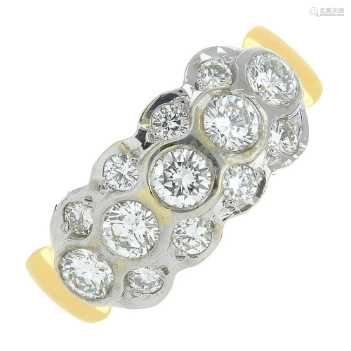 An 18ct gold brilliant-cut diamond dress ring.Estim…