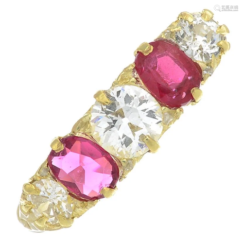 A ruby and diamond five-stone ring.Total ruby wei…