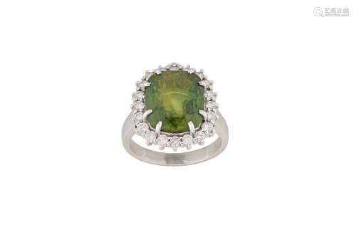 A green sapphire and diamond cluster ring