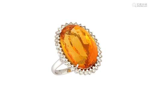 A citrine and diamond cluster ring