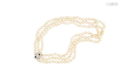 A triple strand cultured pearl, sapphire and diamond necklace