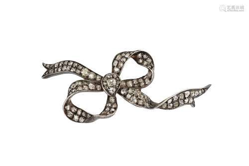 A diamond bow brooch