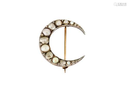 A diamond and half-pearl crescent brooch, circa 1900