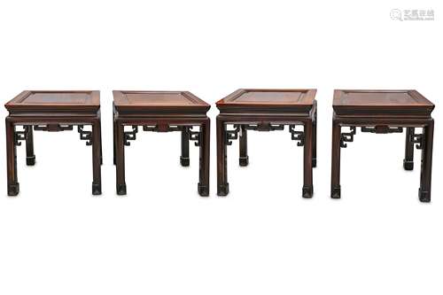 A SET OF FOUR CHINESE WOOD LOW TABLES.