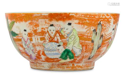 A CHINESE FAMILLE ROSE IRON-RED GROUND 'BOYS' BOWL.