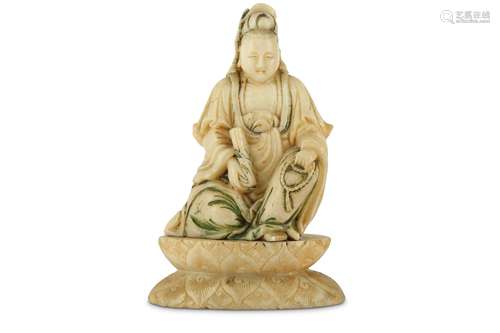 A CHINESE SOAPSTONE FIGURE OF GUANYIN.