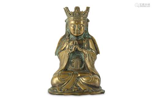 A CHINESE BRONZE FIGURE OF GUANYIN.