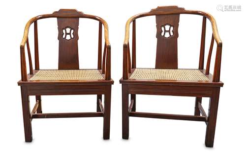 A PAIR OF CHINESE HARDWOOD CHAIRS WITH RATTAN SEATS.