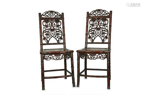 A PAIR OF CHINESE HARDWOOD 'BAMBOO' CHAIRS.