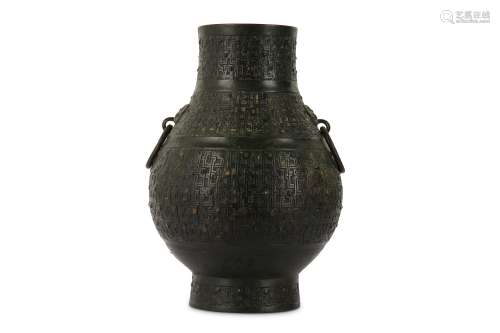 A CHINESE ARCHAISTIC BRONZE VASE, HU.