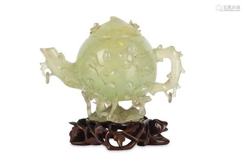 A CHINESE SERPENTINE ‘PEACH’ TEAPOT AND COVER.