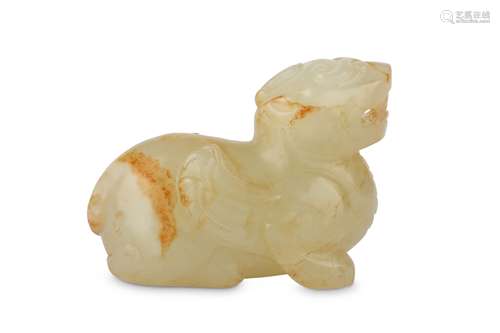 A CHINESE PALE CELADON CARVING OF A QILIN.