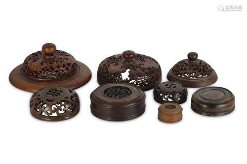 A COLLECTION OF CHINESE WOOD COVERS.