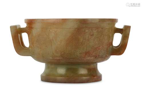 A CHINESE PALE CELADON ARCHAISTIC CUP.