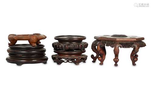 A COLLECTION OF CHINESE WOOD STANDS.